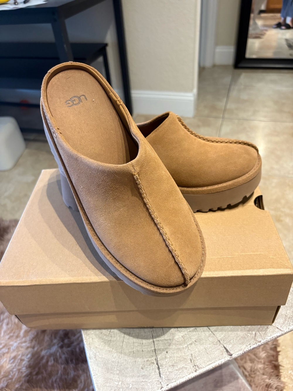 UGG Women's Suede Slip-On Mule in Chestnut Tan